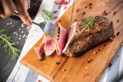 cutting-roasted-beef-sirloin-with-rosemary-pepper.jpg